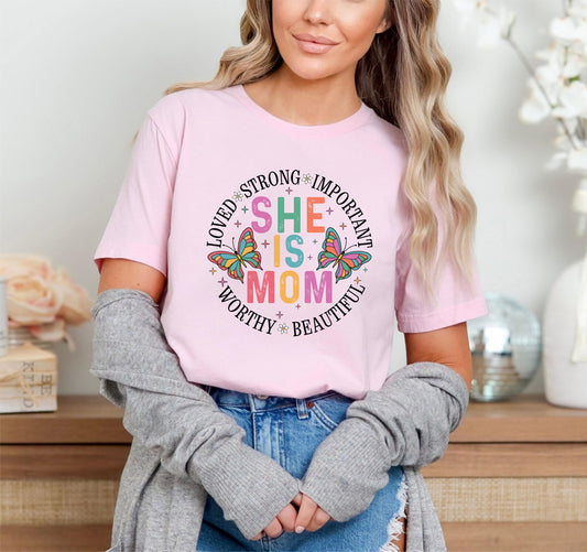 She Is Mom T-Shirt – Empowering Motherhood Tee, Inspirational Mom Life Shirt, Gift For Her, Strong Woman Graphic Top, Unisex Family Love Tee US 03